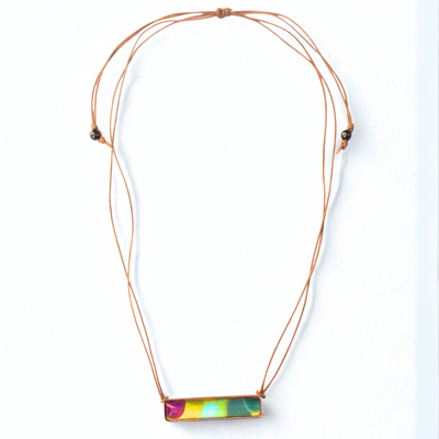 Necklace with a colorful rectangular pendant on a white background