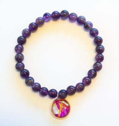 Amethyst round bead gemstone bracelet with abstract art design in a 12mm rose gold charm