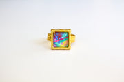 Gold ring with abstract art in a square charm 